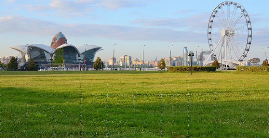 Panorama Ferris wheel and shopping entertainment center on the Caspian Sea coast in Baku