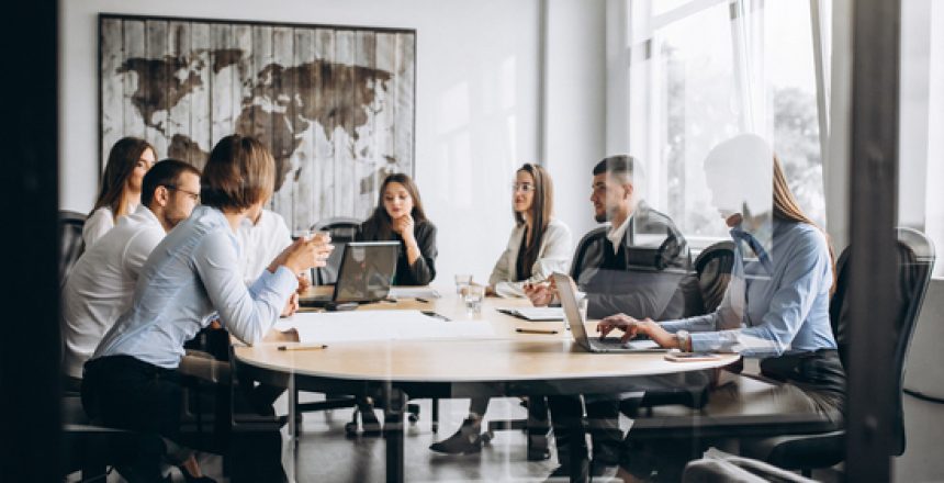 Group of people working out business plan in an office